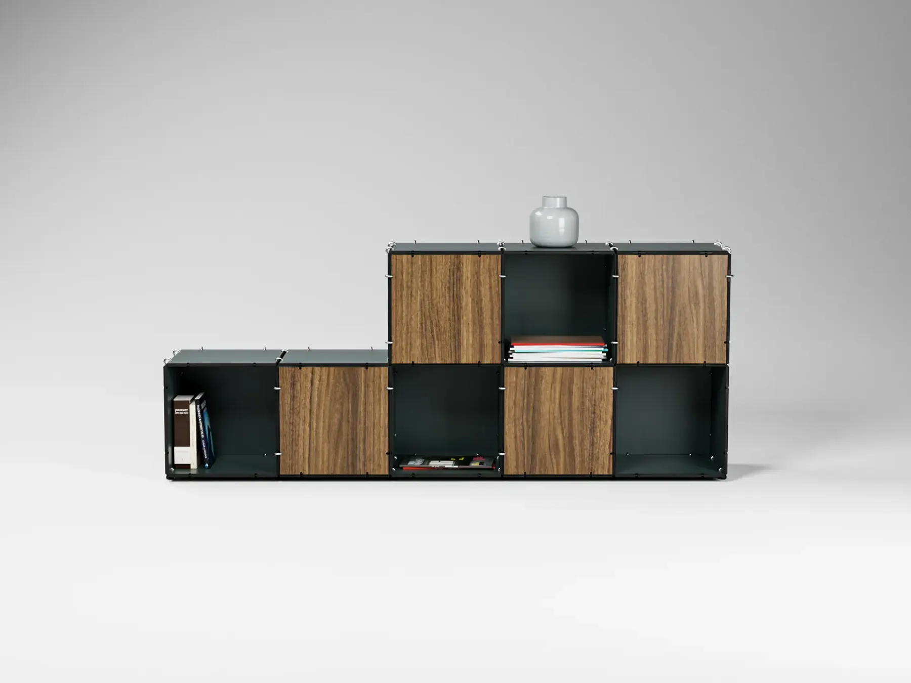 Anillo shelf configuration in black and walnut, built up in steps